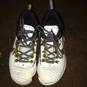 Nike Athletic Shoes with Gold Accents
